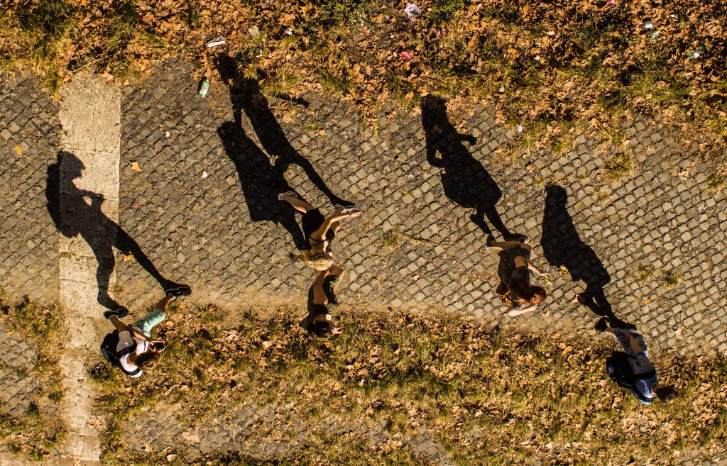 college students on the path back to school library